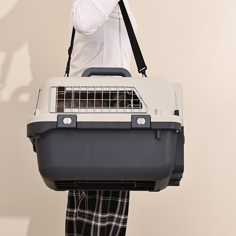 Airline Pet Crate designed for pet air travel, featuring a rigid enclosure, ventilation openings, secure door, and interior space for comfortable positioning.